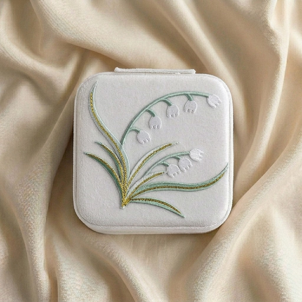 Yuri embroidered travel jewellery case flat lay Italian flannelette exterior with lily of the valley motif — MonBebe Singapore