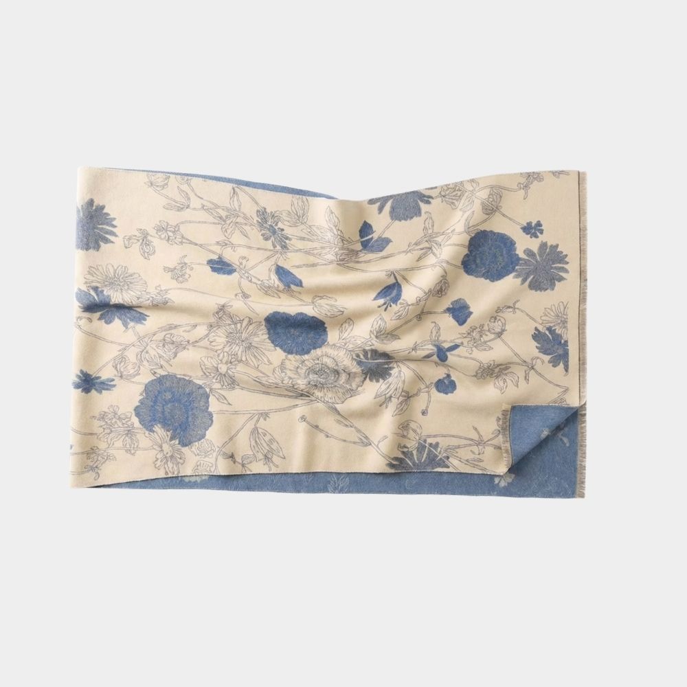 Floral patterned wool scarf with blue flowers on a beige background