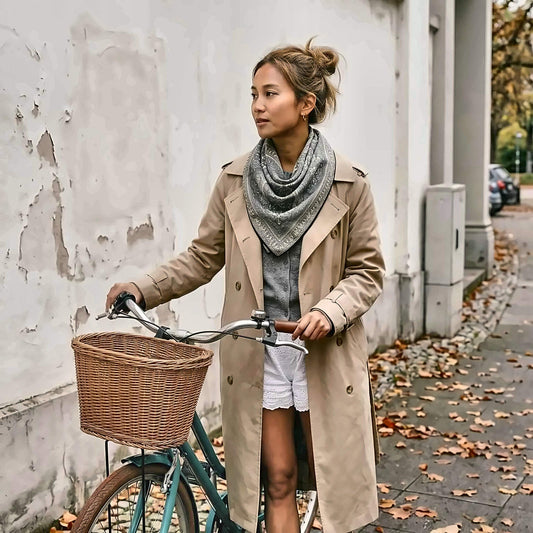 triangular silk-wool scarf with paisley print, worn outdoors in a natural setting