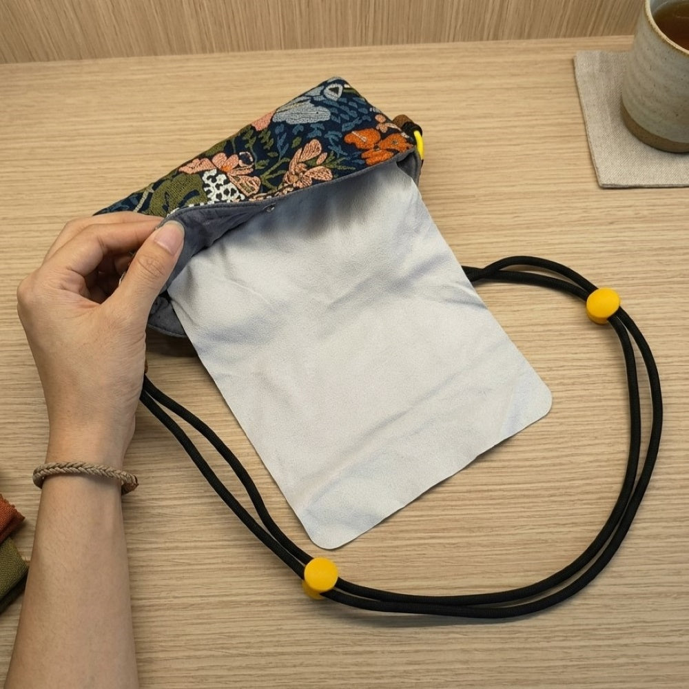 Soft interior lining of Bloom embroidered glasses case — scratch-free, fits glasses up to 16cm