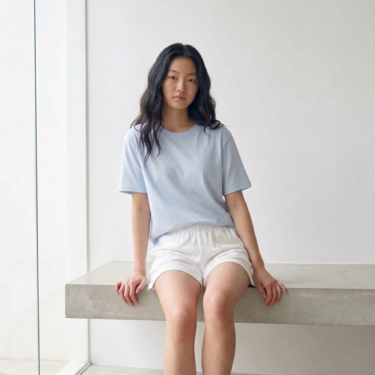 Girl wearing sky blue cool-touch lounge top with built-in bra pad — ages 9 to 15