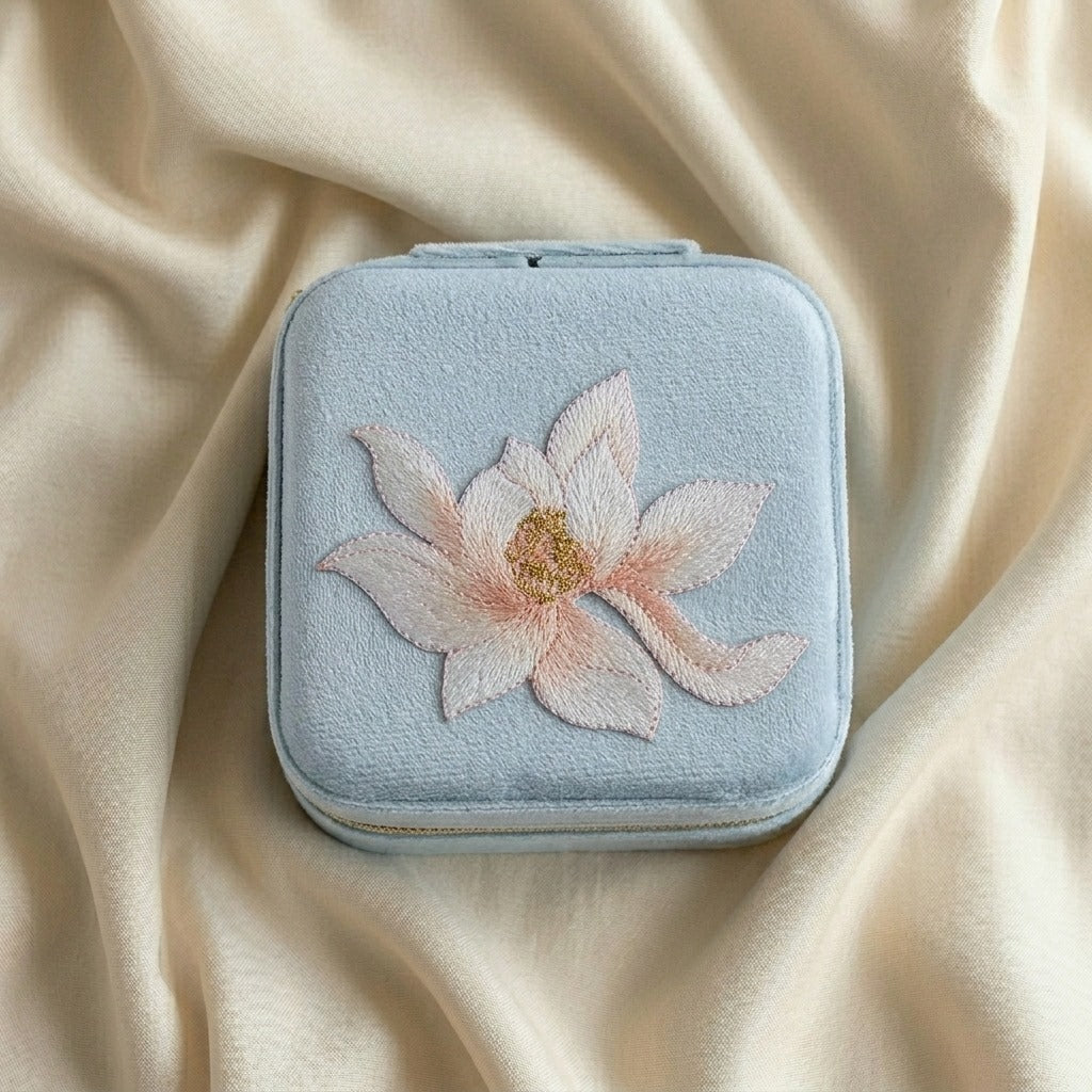 Lianne embroidered travel jewellery case flat lay Italian flannelette exterior with lotus motif —  MonBebe Singapore