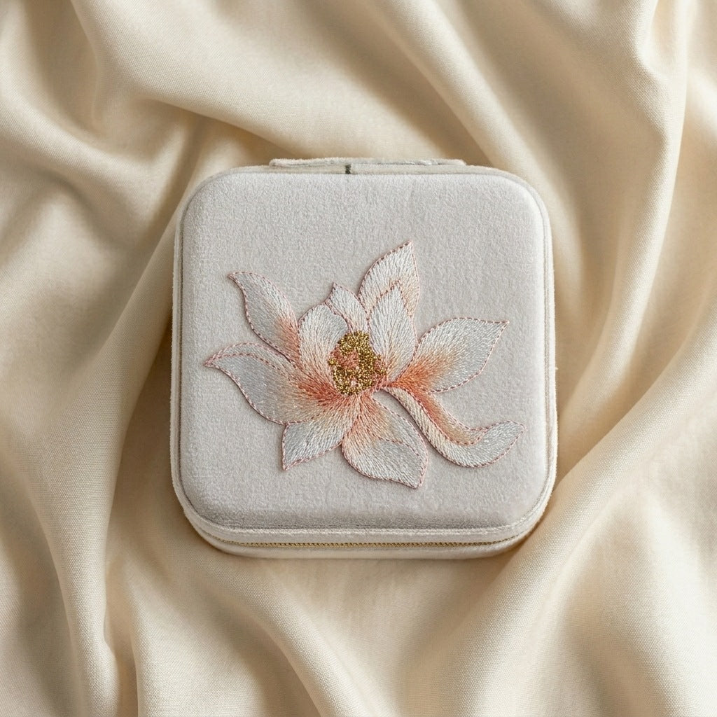Lianne embroidered travel jewellery case flat lay Italian flannelette exterior with lotus motif —  MonBebe Singapore