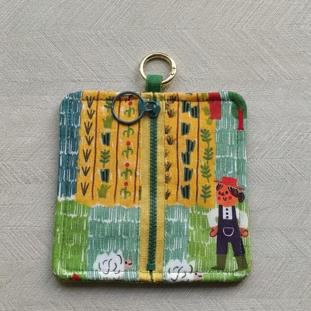 Little Farmhand Everyday Pouch flat lay, farmer and sheep print, MonBebe Singapore