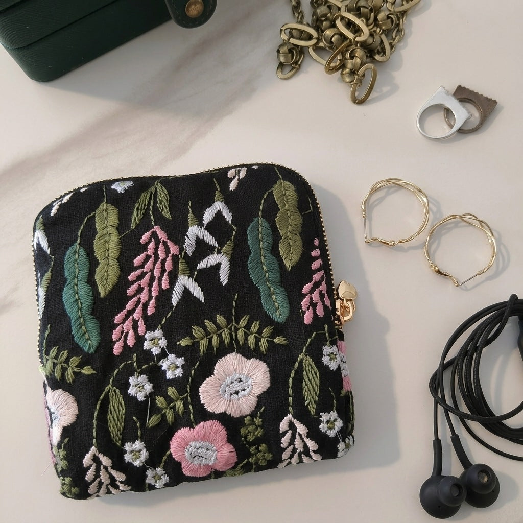 Briar pouch styled with rings, earrings and a necklace, MonBebe Singapore