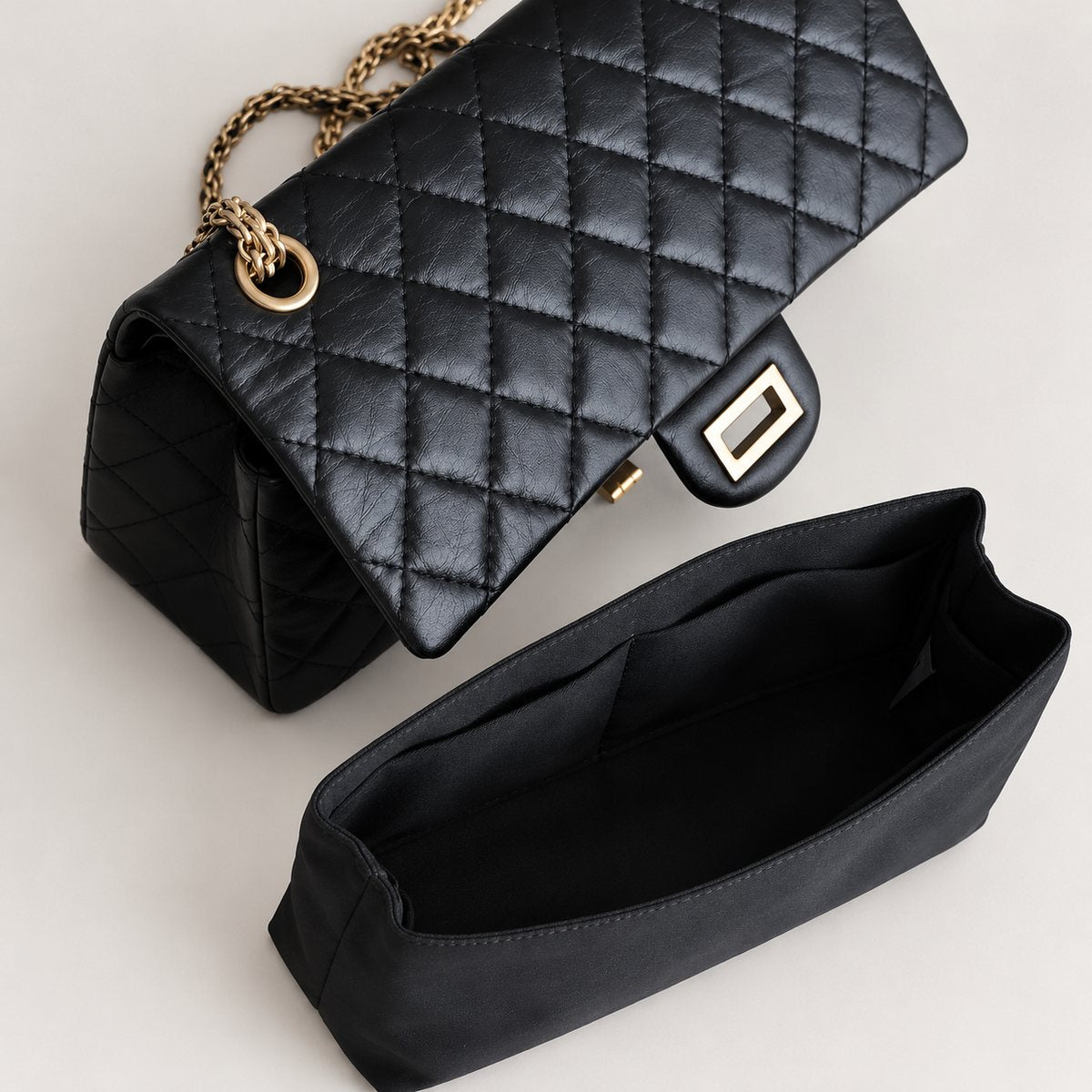 Chanel 2.55 shown empty with organiser removed alongside, MonBebe Singapore