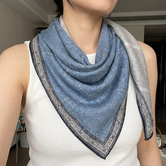 Woman wearing Demi triangular scarf knotted at the front, MonBebe Singapore