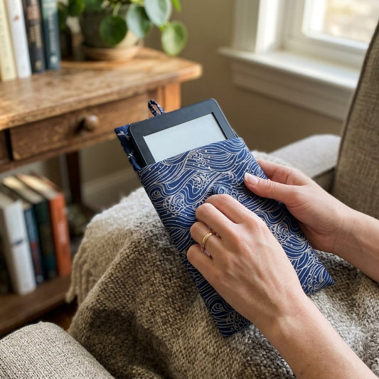 Marin custom-fit e-reader sleeve in Indigo Waves print, styled lifestyle shot, MonBebe Singapore