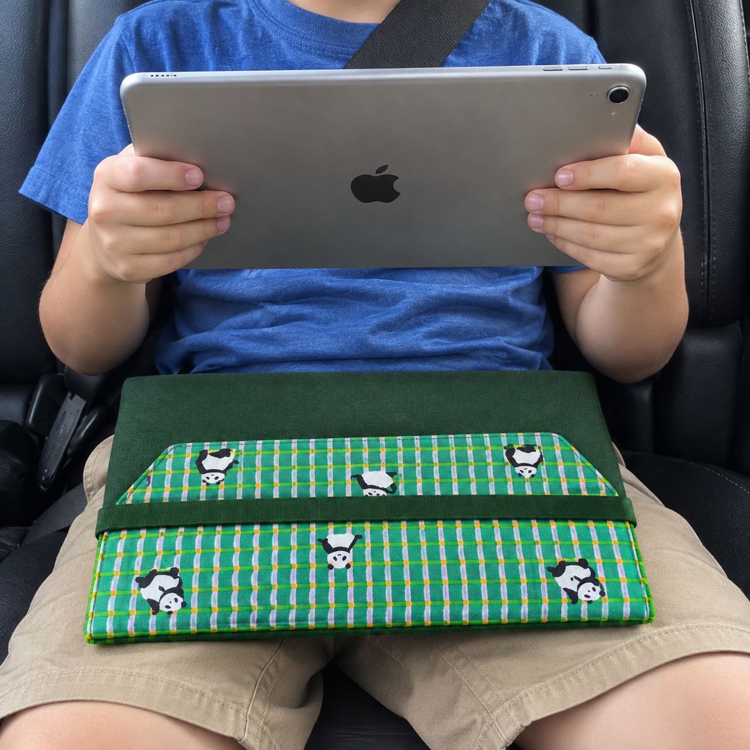 Child holding iPad with Panda Pals laptop sleeve on his lap, MonBebe Singapore