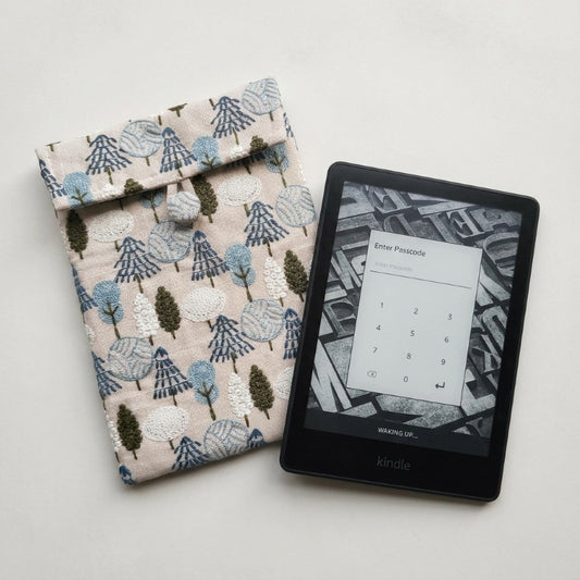 Rowan hand-embroidered e-reader sleeve, forest design on natural linen, MonBebe Singapore