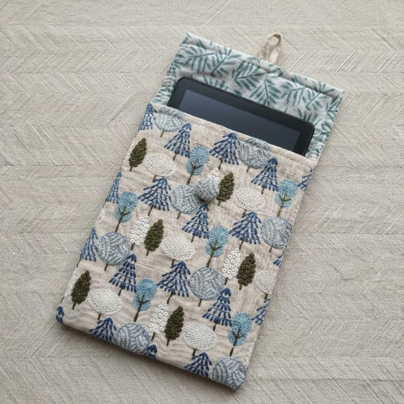E-reader tucked inside Rowan sleeve, MonBebe Singapore