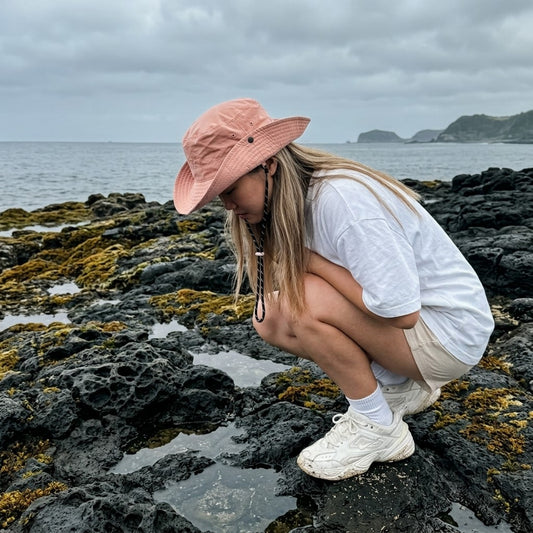 Woman wearing packable UPF50+ wide brim sun hat outdoors, MonBebe Singapore