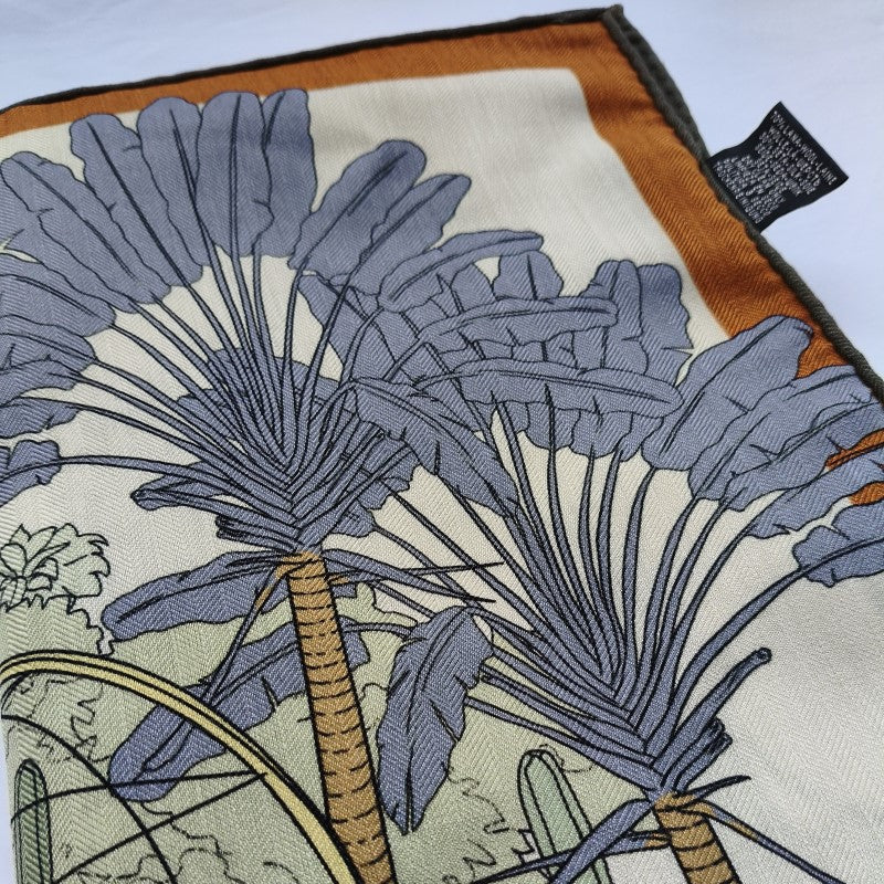 Video of Haru silk-wool blanket shawl showing muted botanical illustration and fabric texture detail —  MonBebe Singapore