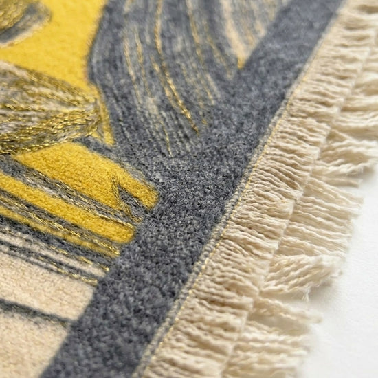 Video of Kii premium wool wrap shawl showing warm yellow and fabric texture detail —  MonBebe Singapore