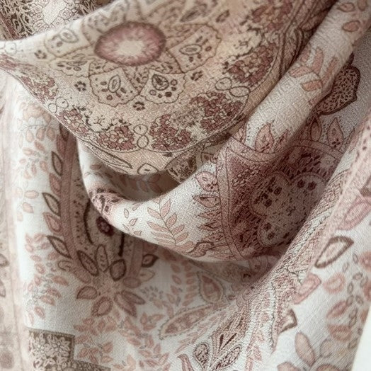 Close-up Sera silk-wool paisley scarf showing double-sided print and fringe edge — MonBebe Singapore