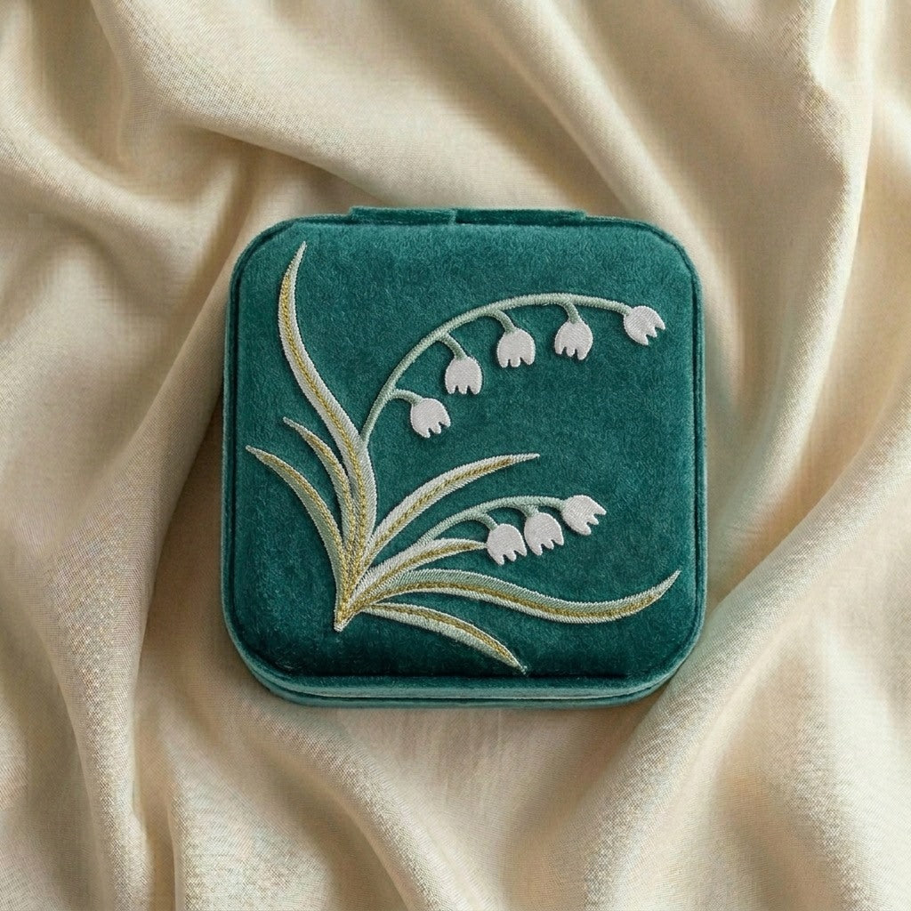 Yuri embroidered travel jewellery case flat lay Italian flannelette exterior with lily of the valley motif —  MonBebe Singapore