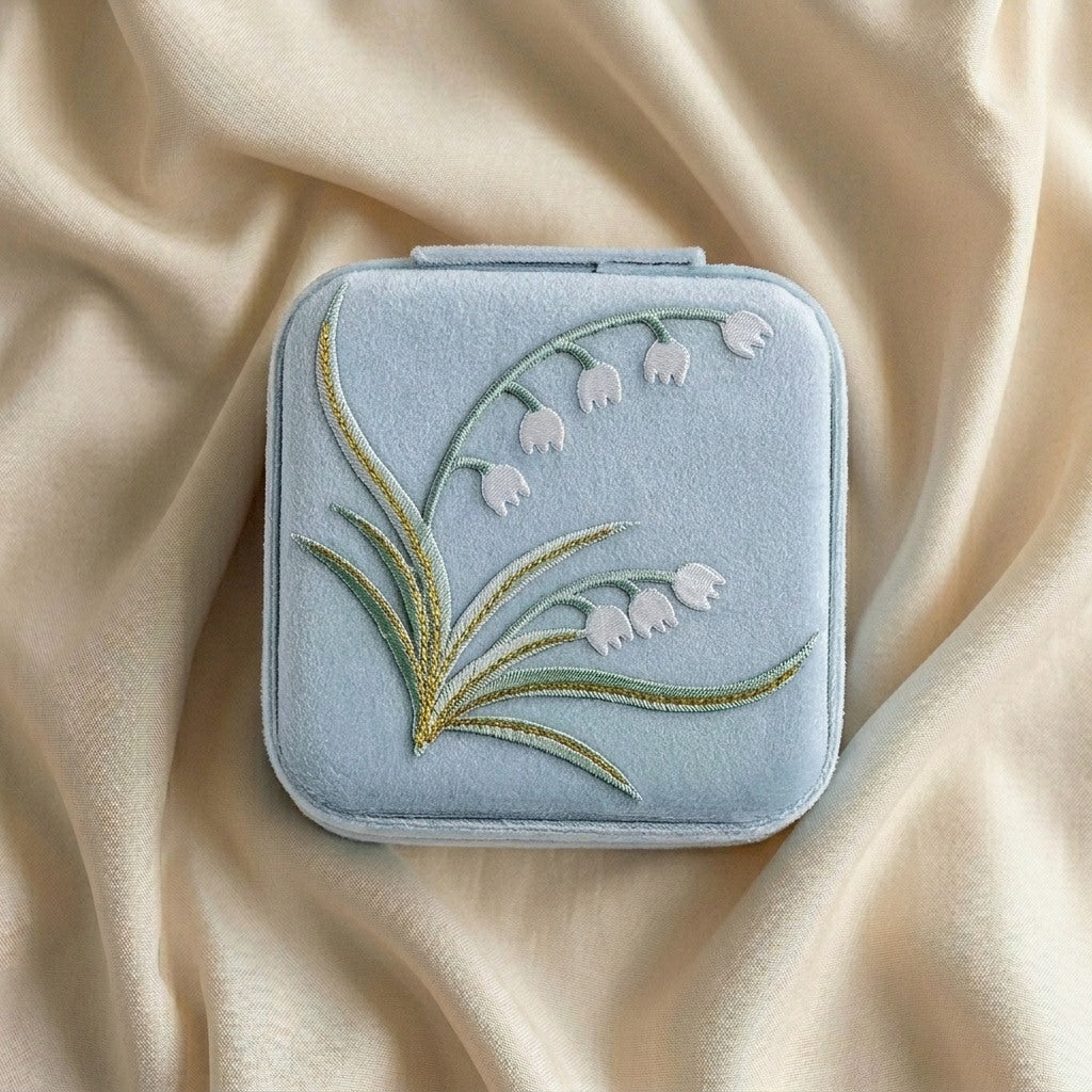 Yuri embroidered travel jewellery case flat lay Italian flannelette exterior with lily of the valley motif —  MonBebe Singapore
