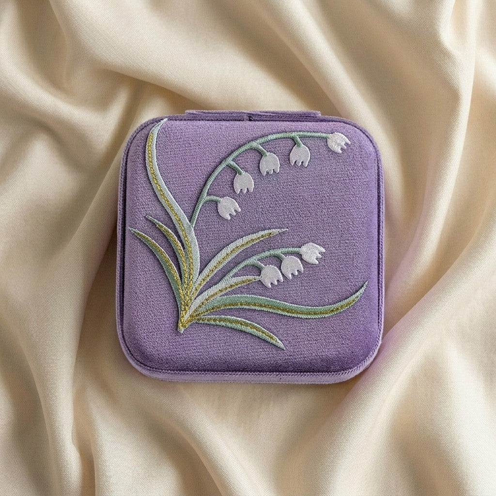 Yuri embroidered travel jewellery case flat lay Italian flannelette exterior with lily of the valley motif —  MonBebe Singapore